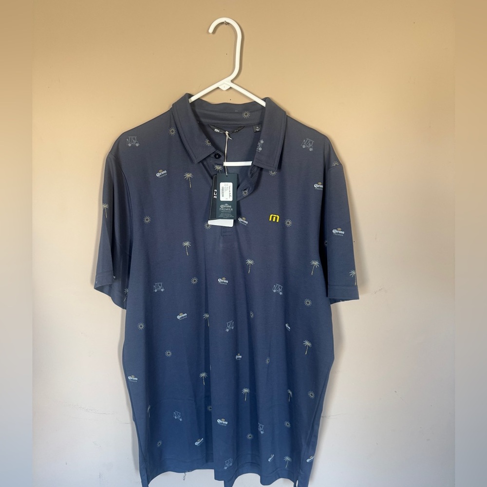 Travis Mathew Blue Polo with Corona logo